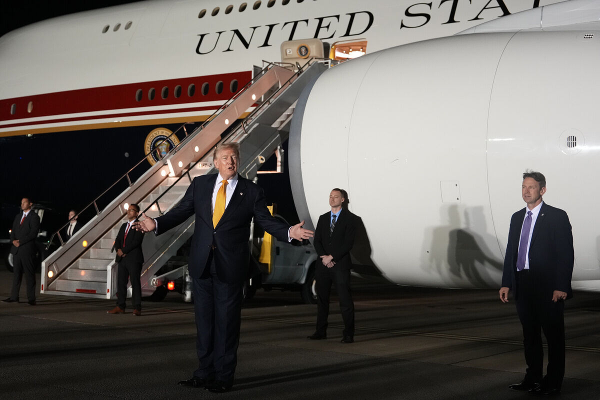 Surrounded by security, President Donald Trump switches planes at US Air Force Base, RAF Mildenhall in Suffolk Eastern England, on his way back to Washington from the NATO summit in Ankara, Turkey, Wednesday, July 8, 2026. (AP Photo/Alex Brandon) Surrounded by security, President Donald Trump switches planes at US Air Force Base, RAF Mildenhall in Suffolk Eastern England, on his way back to Washington from the NATO summit in Ankara, Turkey, Wednesday, July 8, 2026. (AP Photo/Alex Brandon)