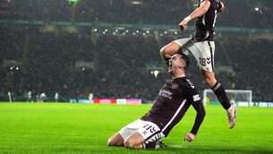 <p>Heart of Midlothian's Oisin McEntee celebrates scoring their side's second goal of the game with team-mates during the William Hill Premiership match at Celtic Park, Glasgow. Picture date: Sunday December 7, 2025. PA Photo. Photo credit should read: Andrew Milligan/PA Wire.</p>