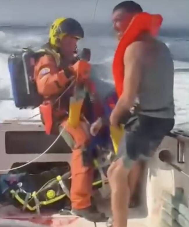 The victim being airlifted from the pleasure craft. Photo: Facebook