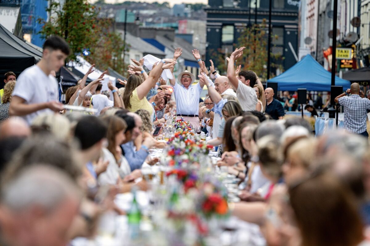 Liam Maher leads the Mexican wave at the Cork on a Fork Long Table event on McCurtain Street. Picture: Chani Anderson Liam Maher leads the Mexican wave at the Cork on a Fork Long Table event on McCurtain Street. Picture: Chani Anderson