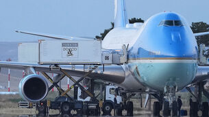 Catering trucks parked near Air Force One on the tarmac at Ankara International Airport in Turkey (Alex Brandon/AP) Catering trucks parked near Air Force One on the tarmac at Ankara International Airport in Turkey (Alex Brandon/AP)