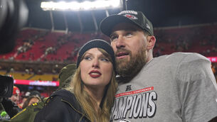 <p>Travis Kelce with Taylor Swift. Picture: AP Photo/Charlie Riedel, File</p>