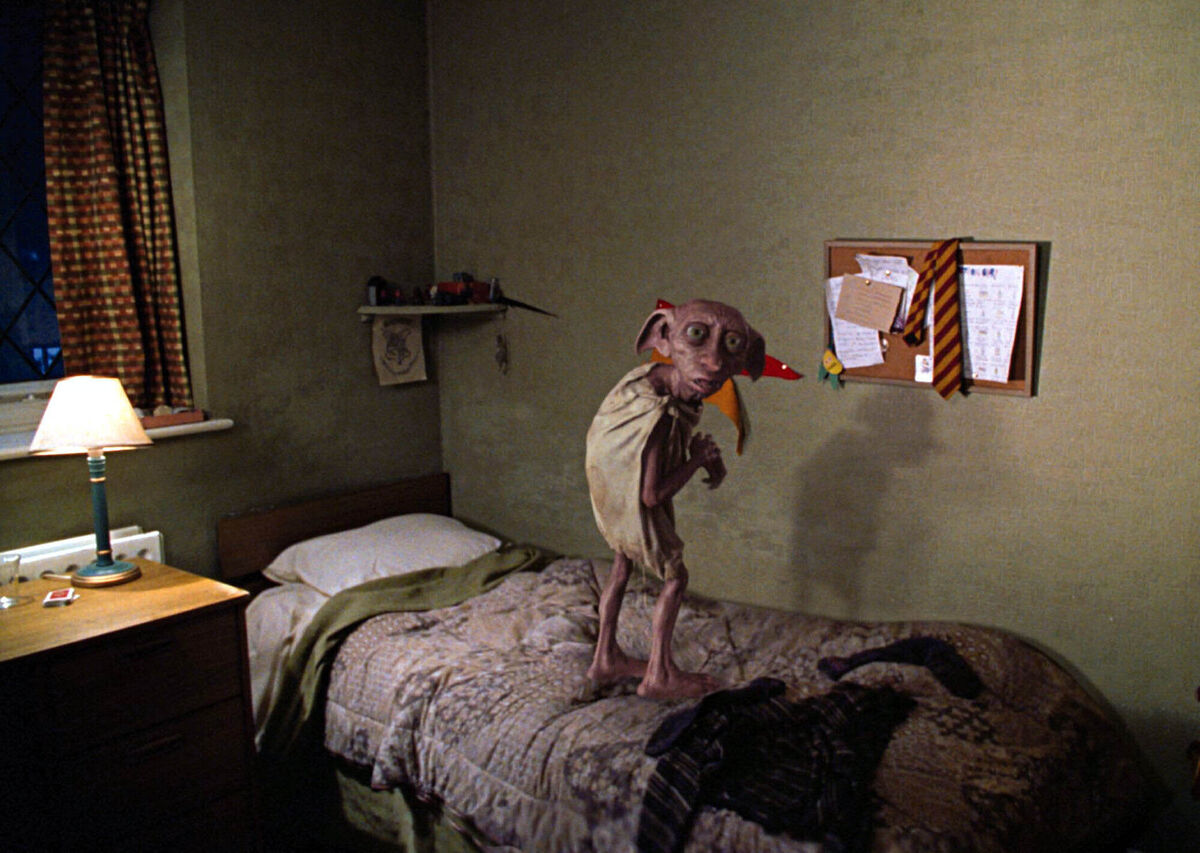 Dobby the house elf in a scene from the first trailer for Harry Potter and the Chamber of Secrets. Dobby never existed, but his death was devastating. Photo: Warner Bros. Dobby the house elf in a scene from the first trailer for Harry Potter and the Chamber of Secrets. Dobby never existed, but his death was devastating. Photo: Warner Bros.