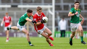 <p>Cork's Donal Herlihy gets past Meath's Niall Smyth in the Electric Ireland All-Ireland Minor Football quarter-final in Thurles. Photo: Diarmuid Brennan/Sportsfocus.</p>