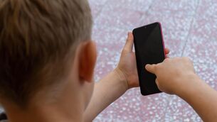 <p>At a recent conference in Cork on the use of technology in human trafficking, chief executive of the Irish Internet Hotline, Mick Moran, said that giving young children smartphones is 'an abdication of responsibility by parents' that sees youngsters 'being sacrificed on the altar of profiteering and consumerism'. File picture</p>