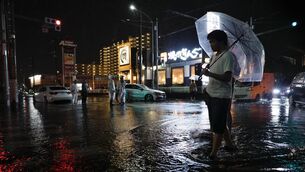 Torrential rain caused flooding in Ichikawa, Chiba prefecture, Japan (Kenzaburo Fukuhara/Kyodo News via AP)