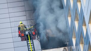 The blaze broke out in a high-rise apartment block in Friedrichshain, Berlin (Christophe Gateau/dpa via AP)