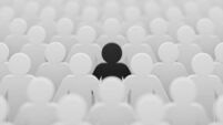 Black color figurine among crowd white people background. Social lifestyle and business competition and strange person concept.