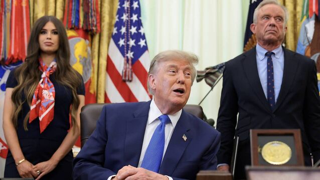 <p>US president Donald Trump with health secretary Robert F Kennedy Jr and Jayme Leagh Franklin after signing an executive order calling for childhood vaccine shots to be spaced out into separate visits. Picture: Getty Images</p>
