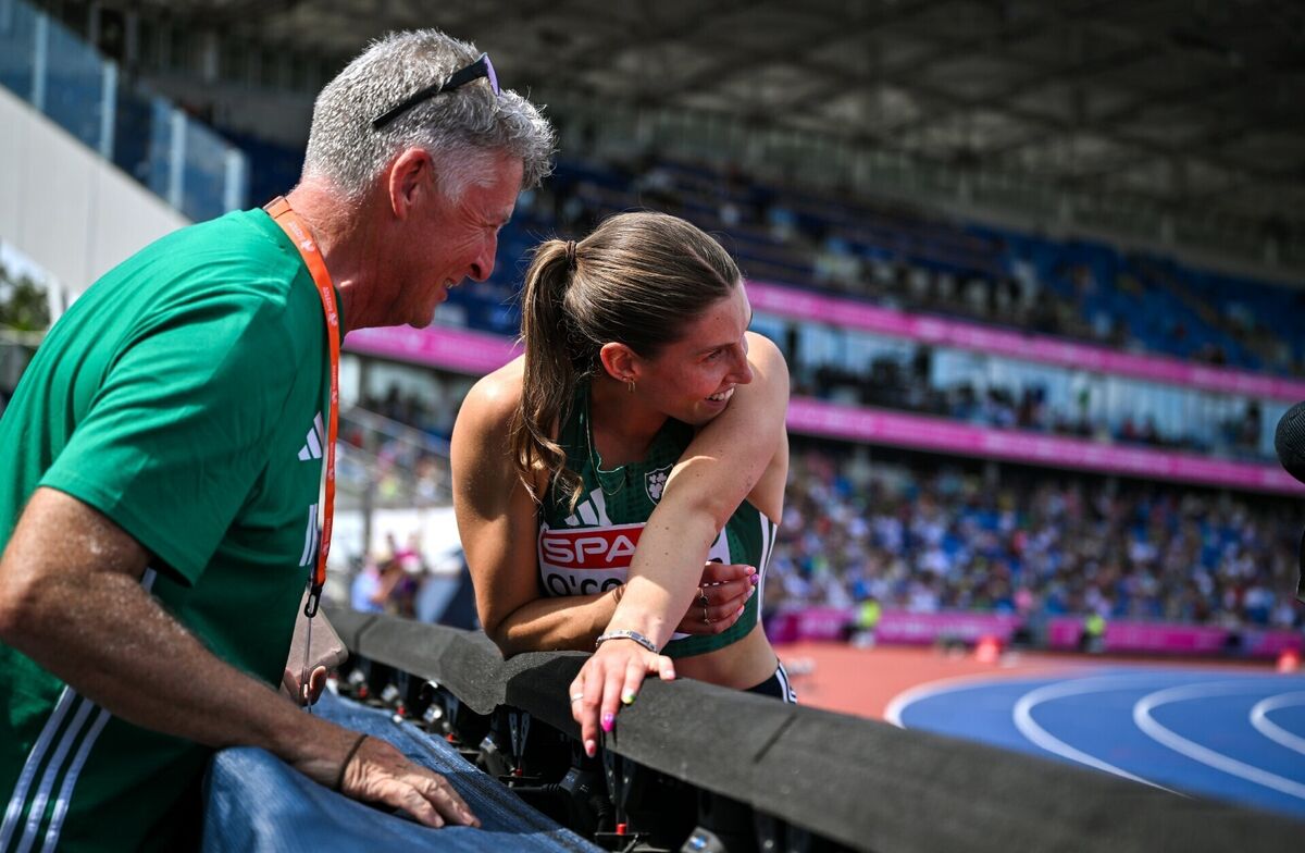Kate O'Connor of Ireland with her coach and father Michael O'Connor after clearing 1.86m in the high jump during the women's heptathlon during day five of the European Athletics Championships 2026 at Alexander Stadium in Birmingham, England. Photo by Sam Barnes/Sportsfile