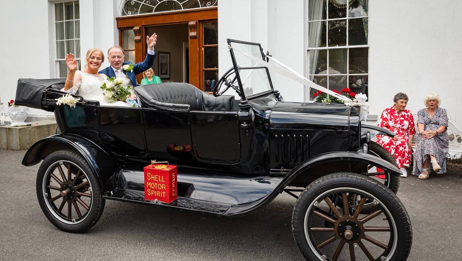 Eileen and William travelled in style in a vintage Ford supplied by the groom's friend Billy Ryan. Pictures: Dermotsullivan.com