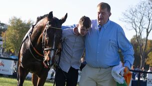 <p>Trainer Shark Hanlon and son Paddy with Hewick after Grand National Pic: Tod Marks/National Steeplechase Association.</p> <p>Trainer Shark Hanlon and son Paddy with Hewick after Grand National Pic: Tod Marks/National Steeplechase Association.</p>