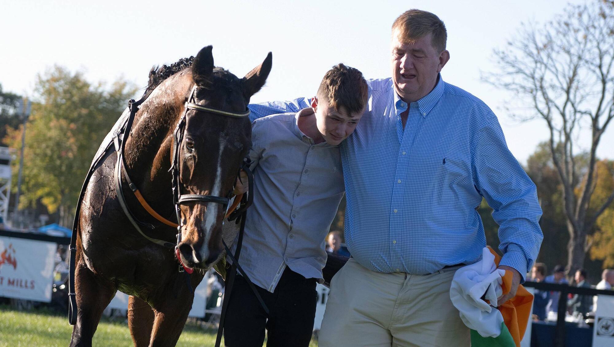 Trainer Shark Hanlon and son Paddy with Hewick after Grand National Pic: Tod Marks/National Steeplechase Association.