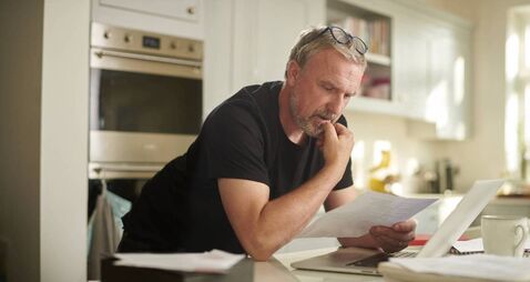 iStock-2257780770.jpg working through the household bills