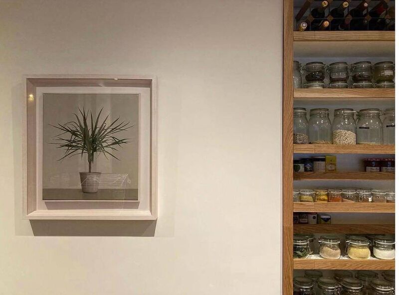 Artwork by Comhghall Casey in Rachel Earley's kitchen.
