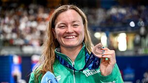 <p>Mona McSharry celebrates with her bronze medal from the 200m breaststroke final at the European Aquatics Championships. Pic: ©INPHO/Giorgio Scala</p>