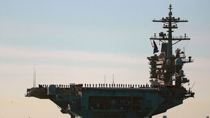 Aircraft carrier USS Abraham Lincoln (KC Alfred/The San Diego Union-Tribune via AP)
