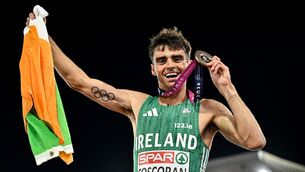 <p>FLYING THE FLAG: Andrew Coscoran of Ireland celebrates with his bronze medal. Pic: Sam Barnes/Sportsfile</p>