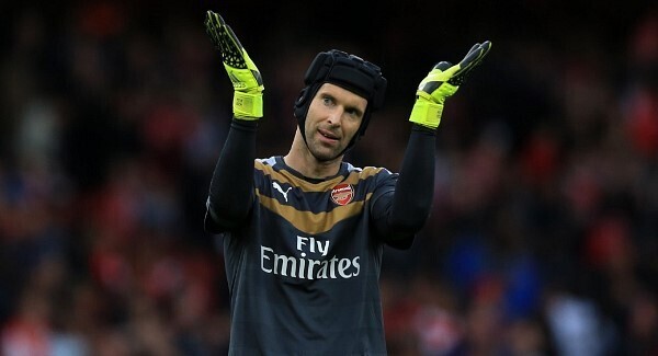 Petr Cech's gloves are off … to Chelsea by mistake
