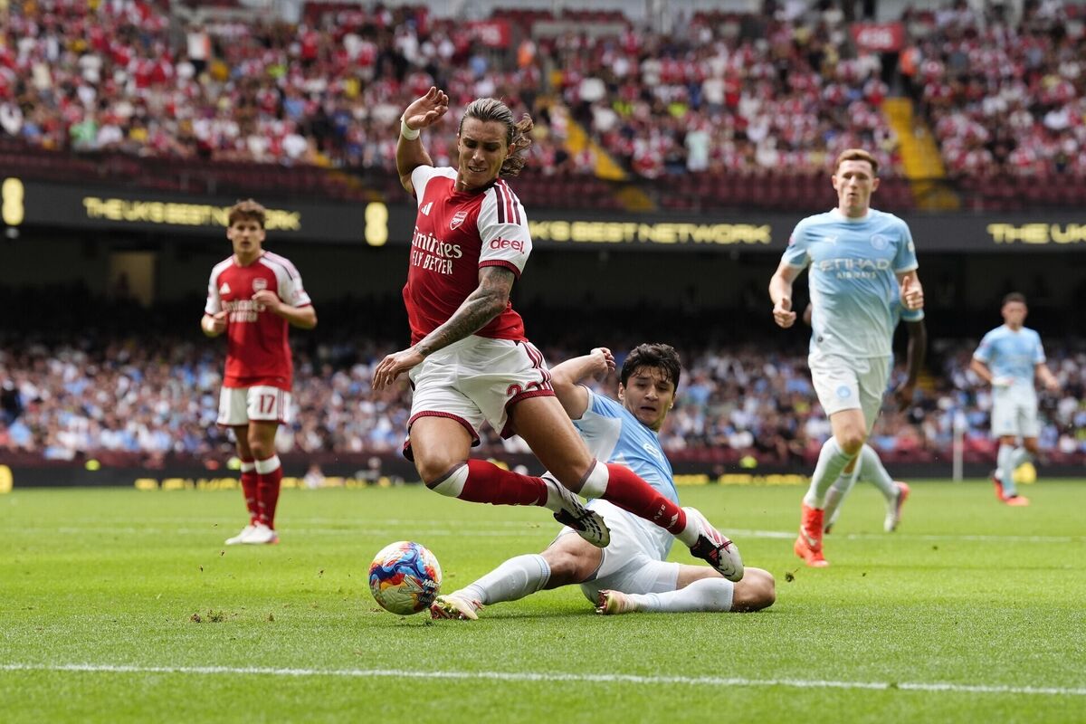 Arsenal's Riccardo Calafiori (centre left) is tackled by Manchester City's Abduqodir Khusanov during the FA Community Shield match at the Principality Stadium, Cardiff. Picture: Nick Potts/PA Wire. 