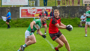 <p>Ballingeary's Seamus O Tuama takes possession in as Aghabullogue’s John Corkerry closes in. Picture by Noel Sweeney</p> <p>Ballingeary's Seamus O Tuama takes possession in as Aghabullogue’s John Corkerry closes in. Picture by Noel Sweeney</p>