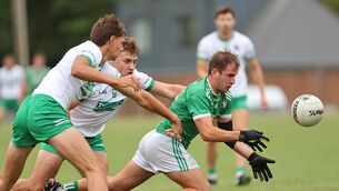 <p> Alan Walsh and Grantas Bucinska of Kanturk tackle Doheny's Jerry Farrell in the McCarthy Insurance Group Senior A Football Championship clash at Kilmurry, Co. Cork. Picture: Jim Coughlan.</p>