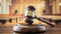 Judges gavel in courtroom legal trial and law background