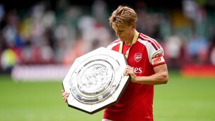 <p>Martin Odegaard got his hands on more silverware on Sunday (Adam Davy/PA)</p>