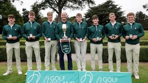 <p>Paul Mitchell and his Portmarnock team celebrate winning the Fred Daly Trophy at Donabate last year Photo: Inpho | Laszlo Geczo</p>