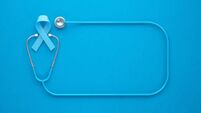Blue Prostate Cancer Awareness Ribbon And Stethoscope On Blue Background - Prostate Cancer Awareness Month Concept