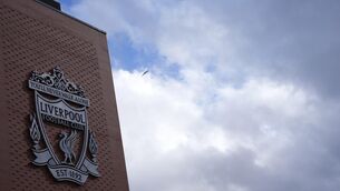 <p>CHANGING TIMES: The Liverpool badge on the side of the stadium ahead of the Premier League match at Anfield, Liverpool. Liverpool owners Fenway Sports Group has announced the sale of a minority stake in the Premier League club to a consortium including Amazon founder Jeff Bezos. Pic: Nick Potts/PA Wire.</p>