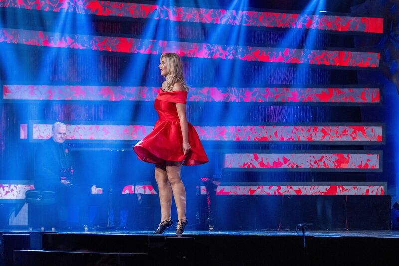 Waterford Rose Cara Comerford on stage at the Kerry Sports Academy, MTU with Dáithí Ó Sé during the Rose of Tralee selection night tonight. Picture: Domnick Walsh