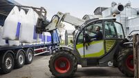 Farmer Receiving  A Delivery Of Nitrogen Sulphur Fertiliser To A Sustainable Farm.