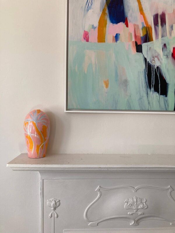 Rachel's bedroom wall featuring an Emma O'Hara vase and a Lola Donoghue print.