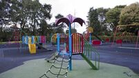 An empty Colourful children playground in the middle of the park