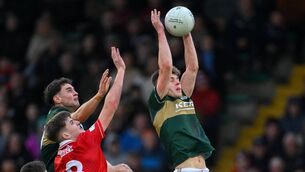 <p>AFL-BOUND? Daniel Kirby of Kerry catches a kickout ahead of teammate Evan Boyle and Darragh Clifford of Cork. Pic:  Brendan Moran/Sportsfile</p>