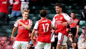 <p>Arsenal's Martin Odegaard (left) celebrates. Pic: Adam Davy/PA Wire.</p>