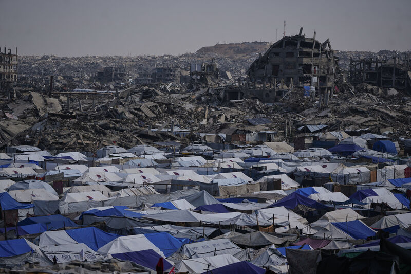 In a country that has been bombed into complete dysfunction, the simple task of gathering documentation becomes a huge challenge. Picture: AP/Abdel Kareem Hana