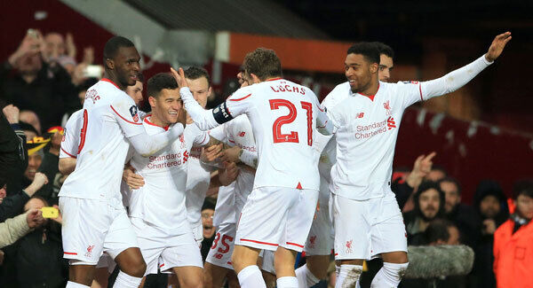 Liverpool's Philippe Coutinho (2nd left) celebrates with his team-mates after scoring Liverpool’s only goal of the FA Cup fourth round replay. Photo: Nick Potts/PA