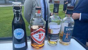 <p>Spirits including Five Farms Irish Cream, Powers Irish Whiskey, Clonakilty Irish Whiskey, and Dingle Irish Whiskey on display at a showcase to mark Ireland's EU presidency. A record 16.46m cases of Irish whiskey were sold globally in 2025.</p>