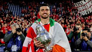 <p>DUE SOUTH: Ireland's Troy Parrott, draped in a tricolour, celeberates AZ Alkmaar's cup win. Pic: Marcel Bonte/Soccrates/Getty Images</p> <p>DUE SOUTH: Ireland's Troy Parrott, draped in a tricolour, celeberates AZ Alkmaar's cup win. Pic: Marcel Bonte/Soccrates/Getty Images</p>