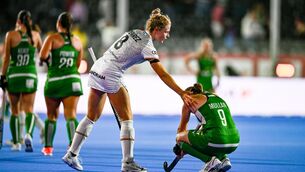 <p>Kathryn Mullan of Ireland is consoled by Emma Puvrez of Belgium. Pic: Ben McShane/Sportsfile</p>