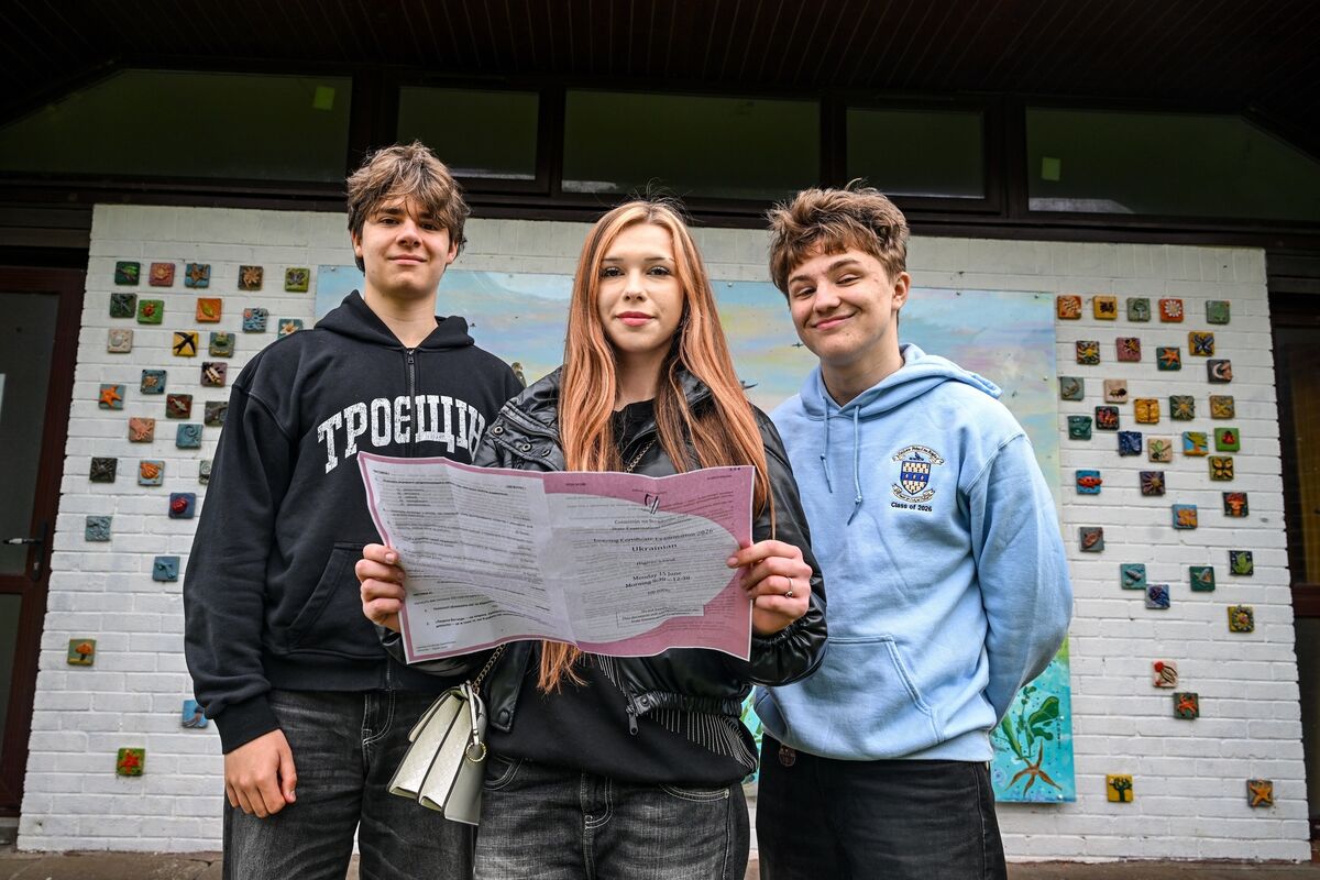 Volodymyr Tkachenko, Kristina Yevdokymenko, and Matthew Kanyuka at Nagle Community College, Cork, following their Leaving Certificate Ukrainian examination last week. 	Picture: Chani Anderson
                    