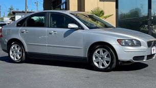 <p>A stock image of a similar make and model 2006 Volvo S40. The car has a distinctive dark grey-coloured driver's-side wing mirror and a yellow tax disc holder in the windscreen.</p> <p>A stock image of a similar make and model 2006 Volvo S40. The car has a distinctive dark grey-coloured driver's-side wing mirror and a yellow tax disc holder in the windscreen.</p>