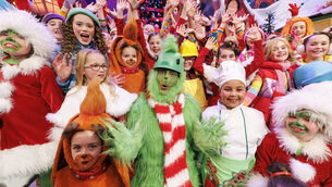 <p>Applications for this year's Late Late Toy Show are now open. Pictured is Patrick Kielty dressed as the Grinch alongside some of the many children who took part in last year's show. Picture: Andres Poveda</p>