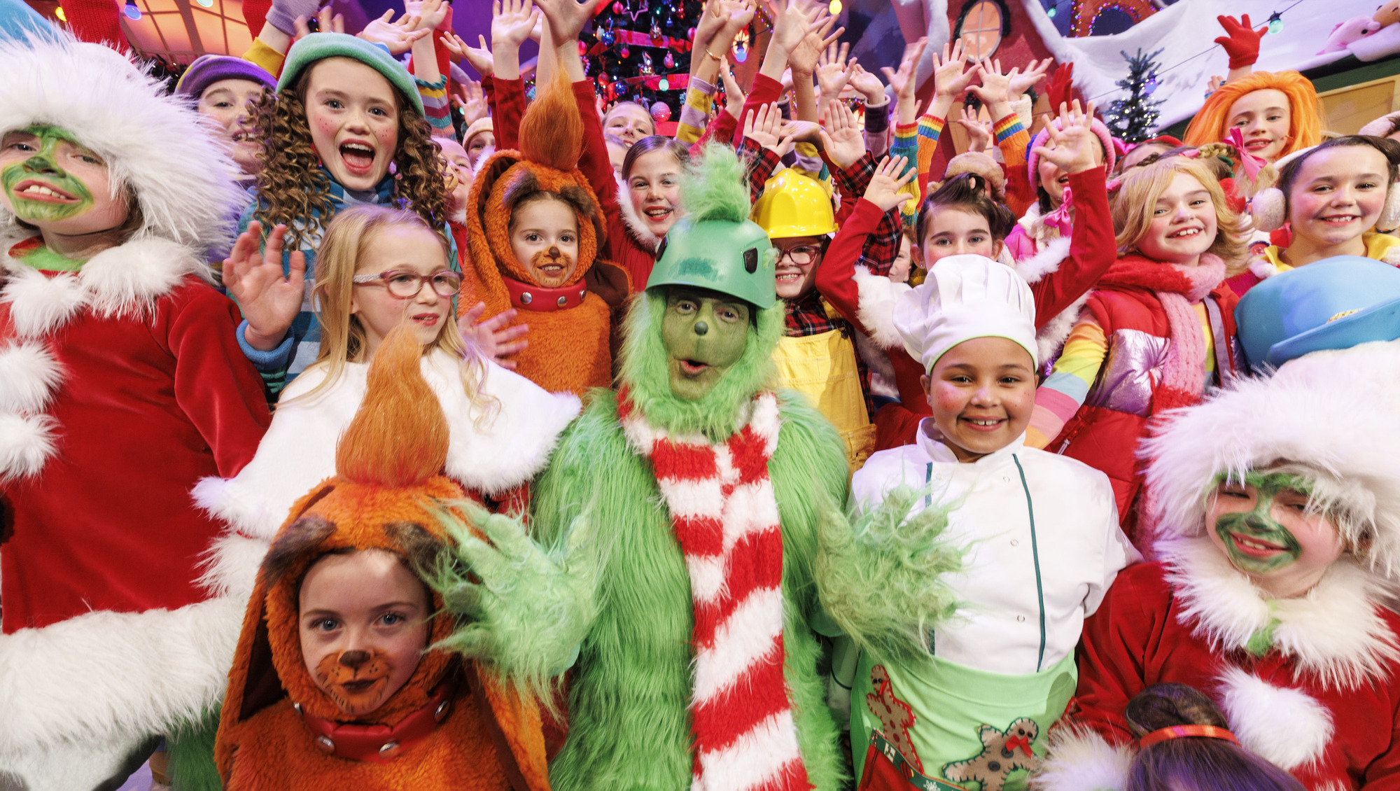 Applications for this year's Late Late Toy Show are now open. Pictured is Patrick Kielty dressed as the Grinch alongside some of the many children who took part in last year's show. Picture: Andres Poveda