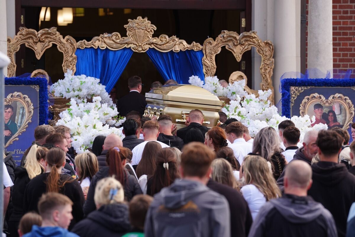 The coffin is carried into St. Michael the Archangel Church in Athy, for the funeral of Joe Carthy, 15, one of the five teenagers who died in a horror motorway crash in Co Kildare last weekend. Picture: Brian Lawless/PA Wire The coffin is carried into St. Michael the Archangel Church in Athy, for the funeral of Joe Carthy, 15, one of the five teenagers who died in a horror motorway crash in Co Kildare last weekend. Picture: Brian Lawless/PA Wire