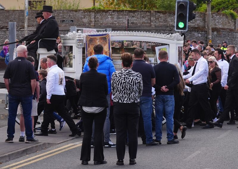 The funeral cortege for Joe Carthy, 15, one of the five teenagers who died in a horror motorway crash in Co Kildare last weekend, arrives at St. Michael the Archangel Church in Athy. Picture: Brian Lawless/PA Wire