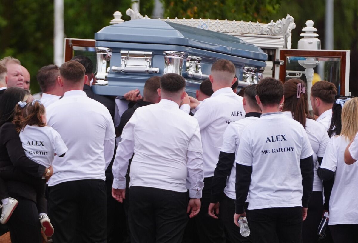 The funeral cortege for Alex McCarthy, one of the five teenagers who died in a horror motorway crash in Co Kildare last weekend, arrives at Holy Family Church, Askea in Carlow. Picture: Brian Lawless/PA Wire The funeral cortege for Alex McCarthy, one of the five teenagers who died in a horror motorway crash in Co Kildare last weekend, arrives at Holy Family Church, Askea in Carlow. Picture: Brian Lawless/PA Wire