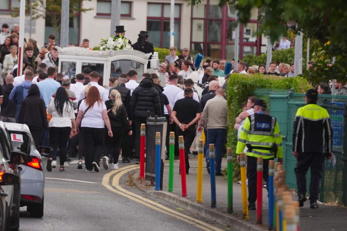 The funeral cortege for Alex McCarthy, one of the five teenagers who died in a horror motorway crash in Co Kildare last weekend, arrives at Holy Family Church, Askea in Carlow. Picture: Brian Lawless/PA Wire The funeral cortege for Alex McCarthy, one of the five teenagers who died in a horror motorway crash in Co Kildare last weekend, arrives at Holy Family Church, Askea in Carlow. Picture: Brian Lawless/PA Wire